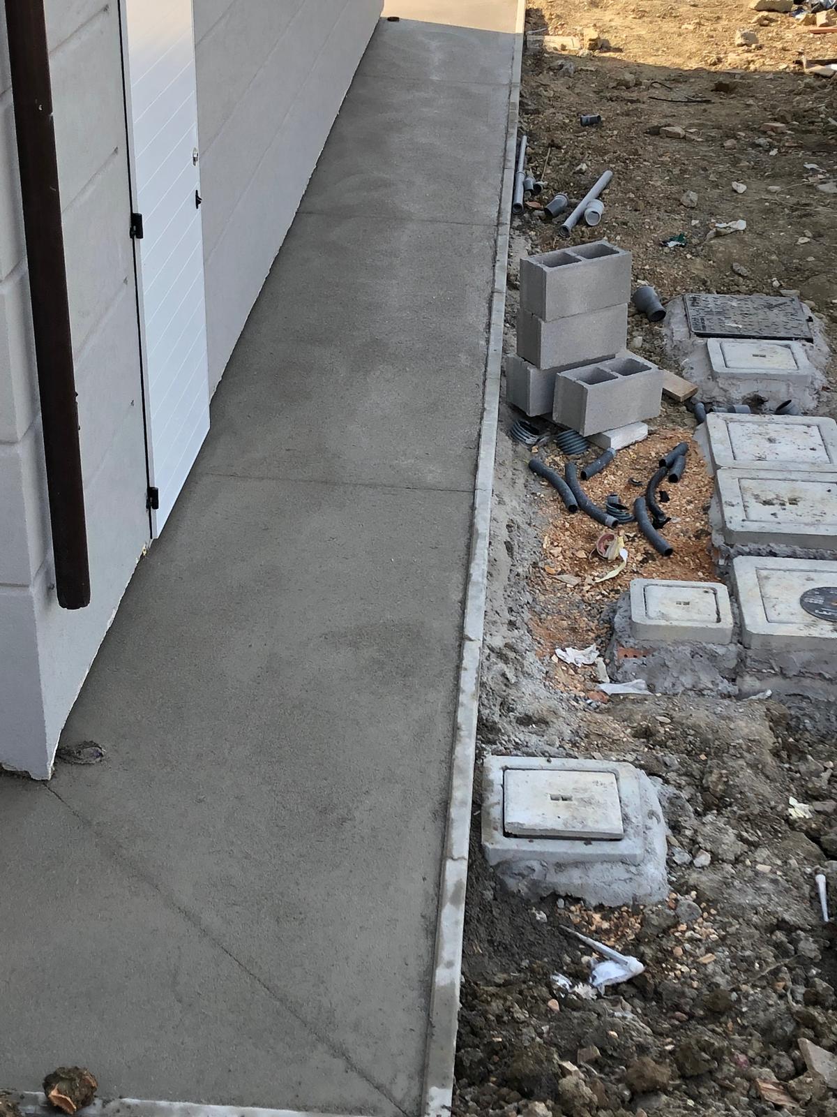 Massetto per cortile esterno con pendenze